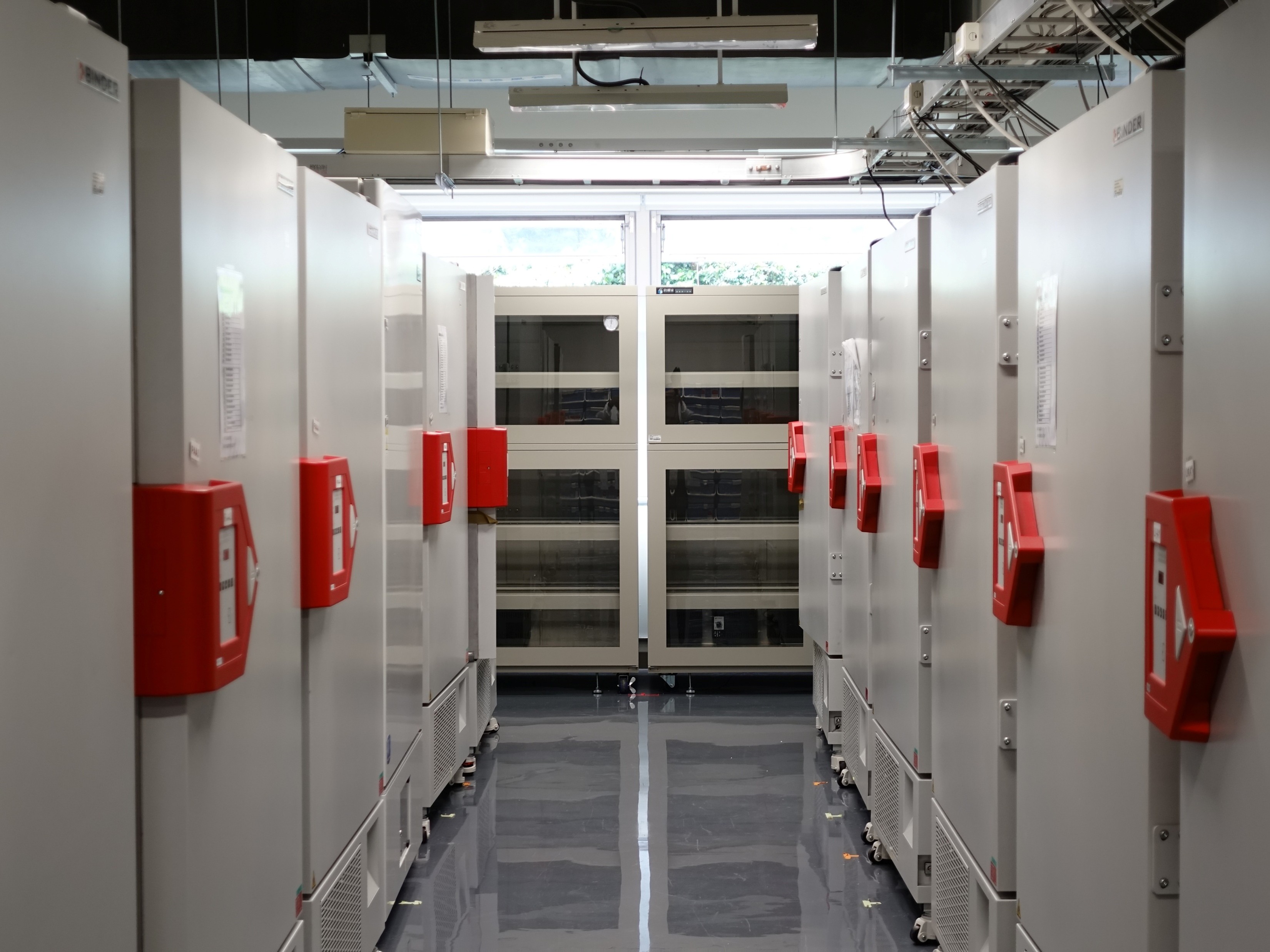 Controlled reference standard storage facility with temperature monitoring and inventory tracking systems